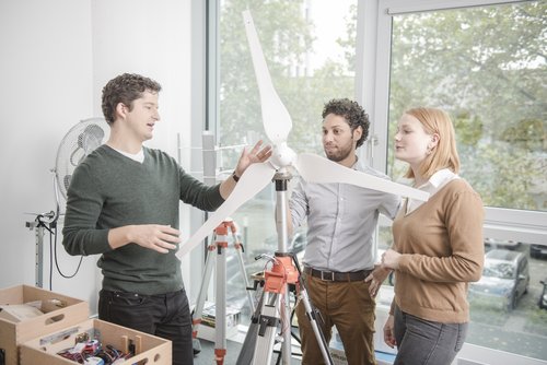 Master Renewable Energy students work on wind energy model.