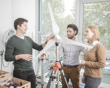 Master Renewable Energy students work on wind energy model.