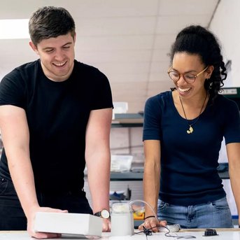 Master Civil Engineering students work on building model.